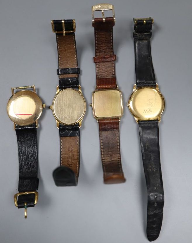 A gentlemans 18ct gold Baume & Mercier manual wind dress wrist watch & 3 other 9ct gold watches.